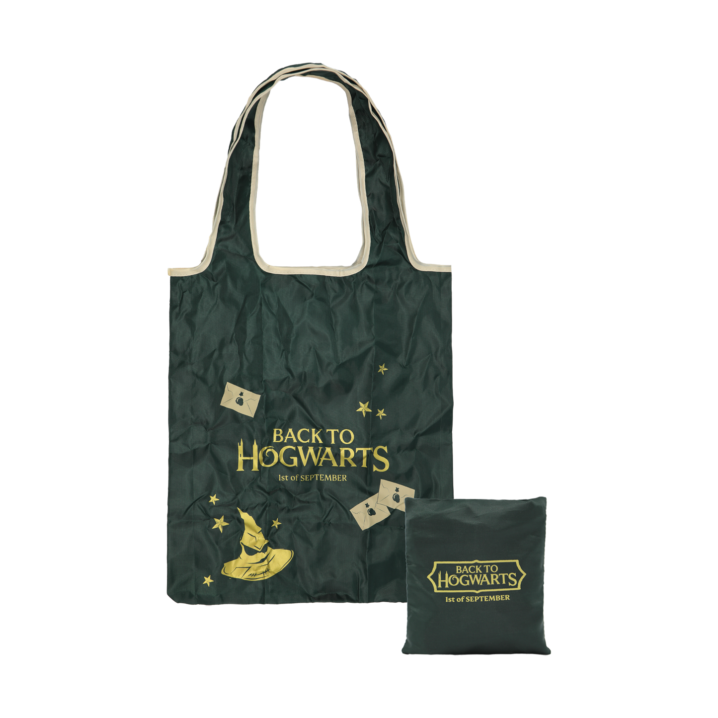 Green tote bag with 'Back to Hogwarts' text and sorting hat graphic
