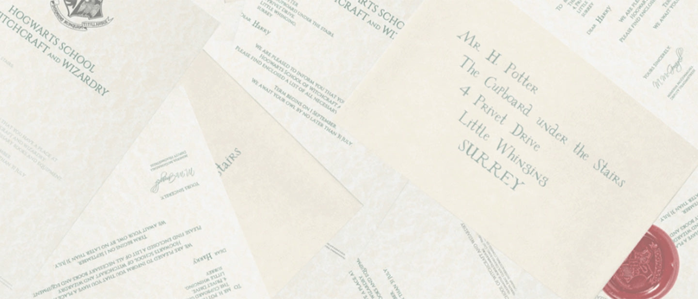 Collection of Hogwarts acceptance letters with a red wax seal on a textured background