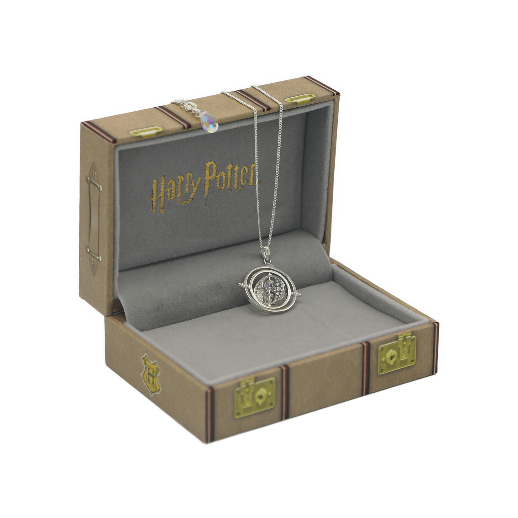 Harry Potter-themed necklace in an open box with 'Harry Potter' branding.