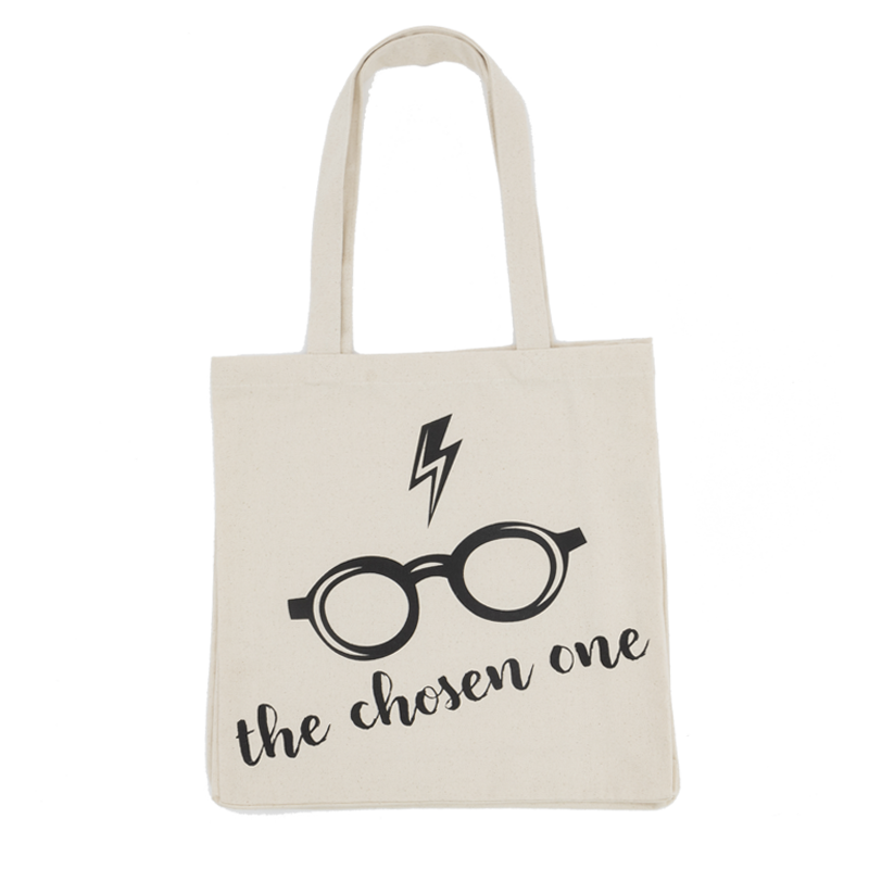 Tote bag with glasses and lightning bolt design on a white background