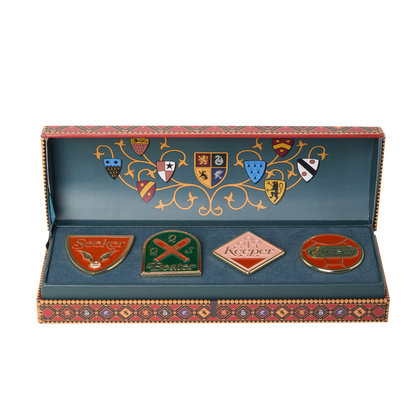 Set of four Quidditch emblems in a decorative box with intricate designs