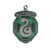 Slytherin magnet with snake emblem and text on a white background